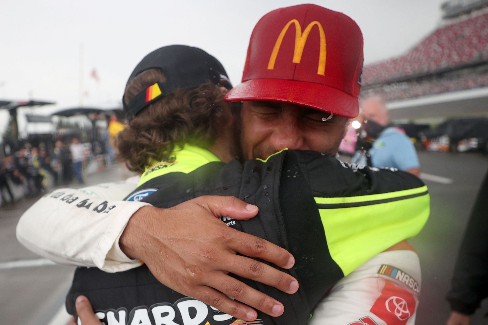 Bubba Wallace celebrates with Ryan Blaney after the NASCAR Cup Series 2021 YellaWood 500. Source: Getty